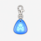 Blue glowing Yogi-Pets dog tag with a silver clip on a white background