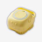 Yogi-Pets 2-in-1 Silicone Dog Massage Brush with Shampoo Yellow with a smiley face on a white background