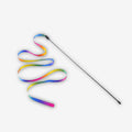 Colorful ribbon attached to a stick on a white background